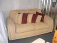 SOFA,  CHAIR and Footrest,  Light biscuit coloured Sofa, ....